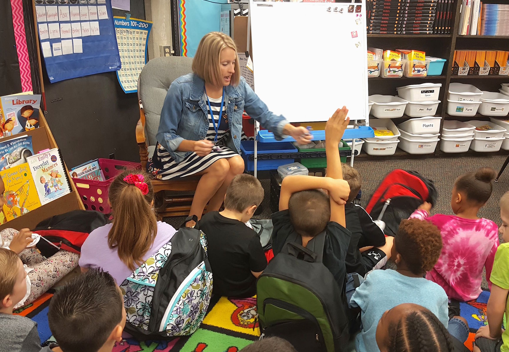 James school, Second-grade teacher interacts
